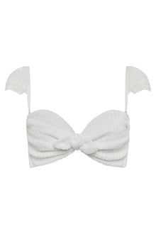 White textured bikini top with bow-tie front and adjustable shoulder straps with shell details.