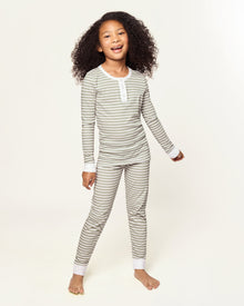 The Kid's Pima Snug Fit Pajama Set in Sage Stripe features green and white horizontal stripes, long sleeves, white cuffs at wrists and ankles, and a small button placket on the shirt. The set is displayed flat on a white background.