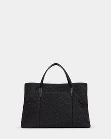 The ASMINE - L325005 Black by Rudsak is a large black quilted monogram tote with two black handles and an embossed geometric pattern, shown on a plain white background.