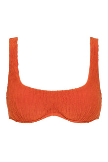 Tangerine bikini top with textured fabric and wide shoulder straps in a scoop neckline style.