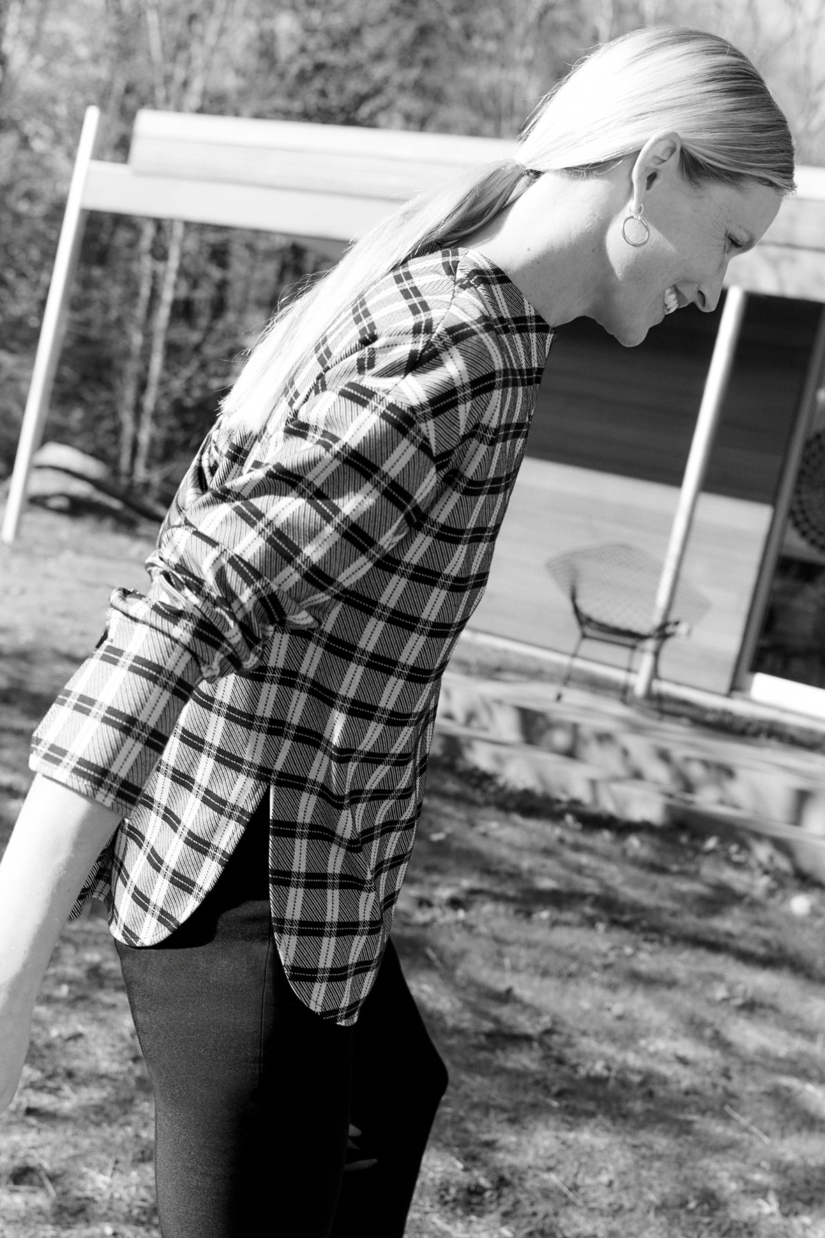 front image of a woman wearing the tully top in checkmate | Exclude