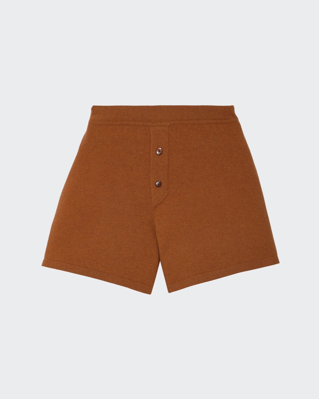 Relaxed fit women's cashmere shorts in a light almond color.