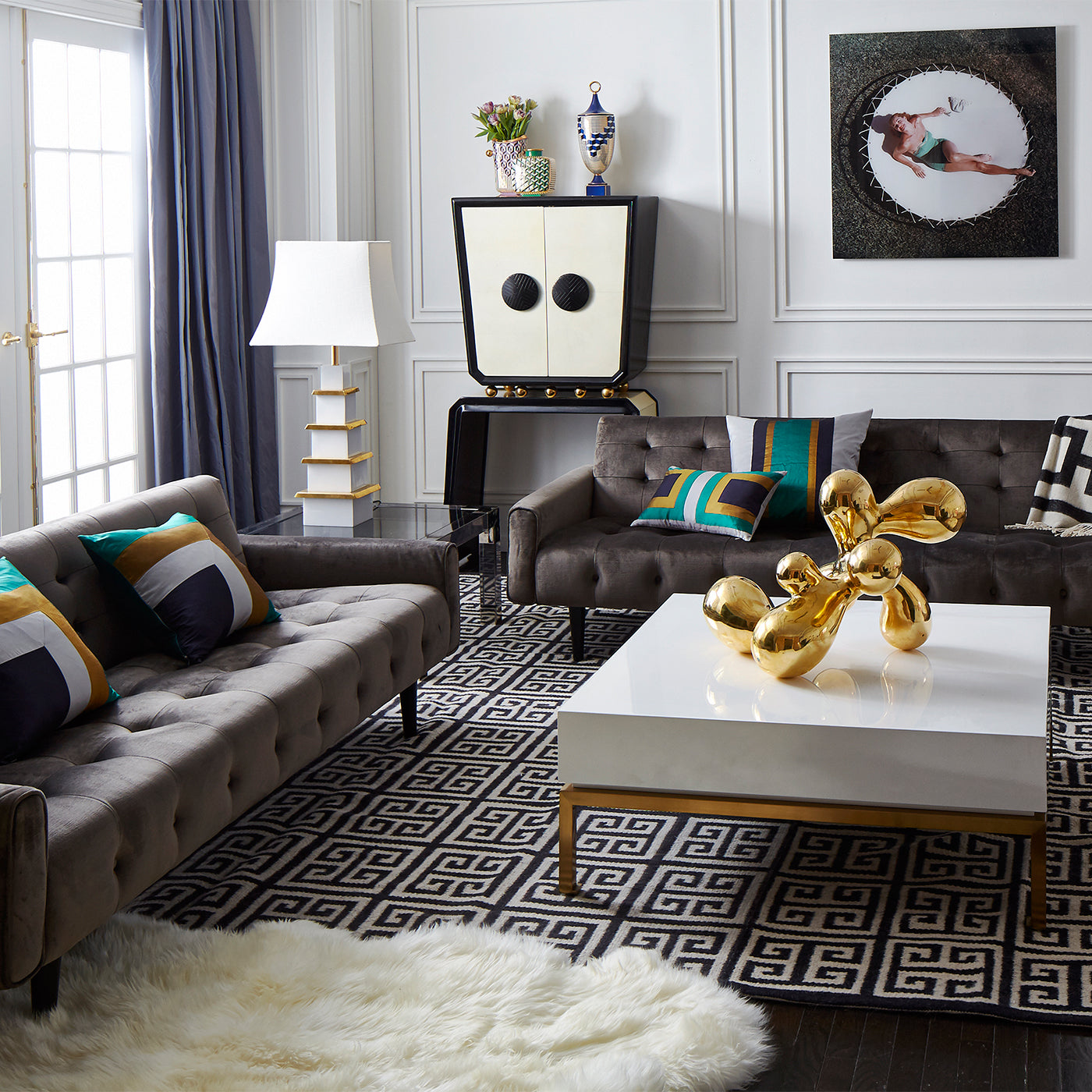 giant brass orb peking cocktail table living room - styled view