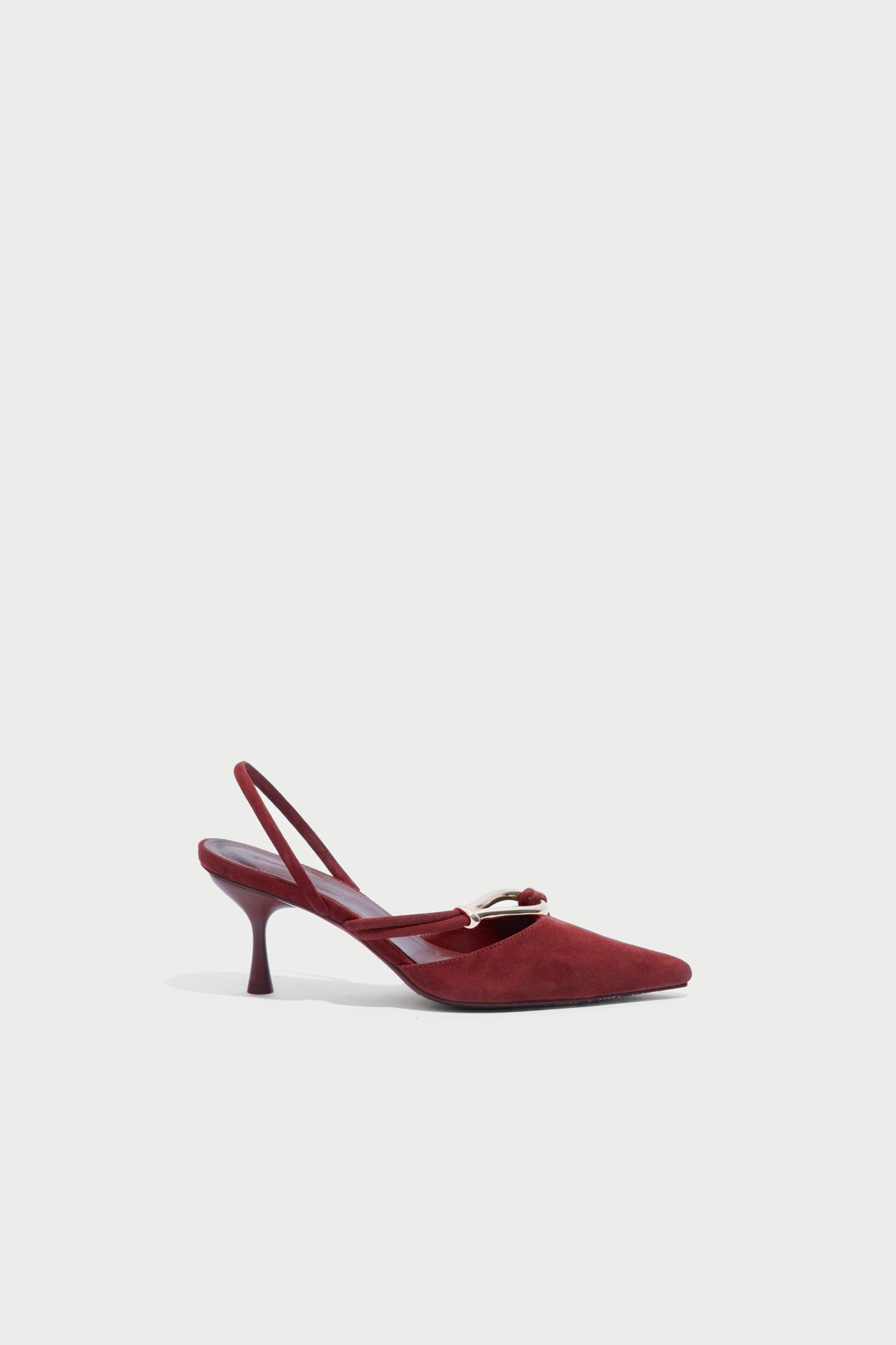 Burgundy suede slingback heel with pointed toe and decorative knot detail on upper.