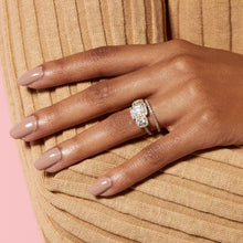 Lifestyle Model. Close up of hand with large engagement ring and eternity ring