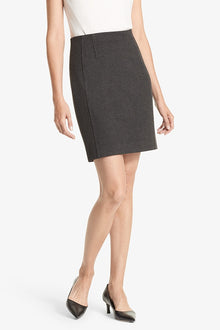 Front image of a woman standing wearing the Crosby skirt textured ponte in Charcoal | Grid | Exclude
