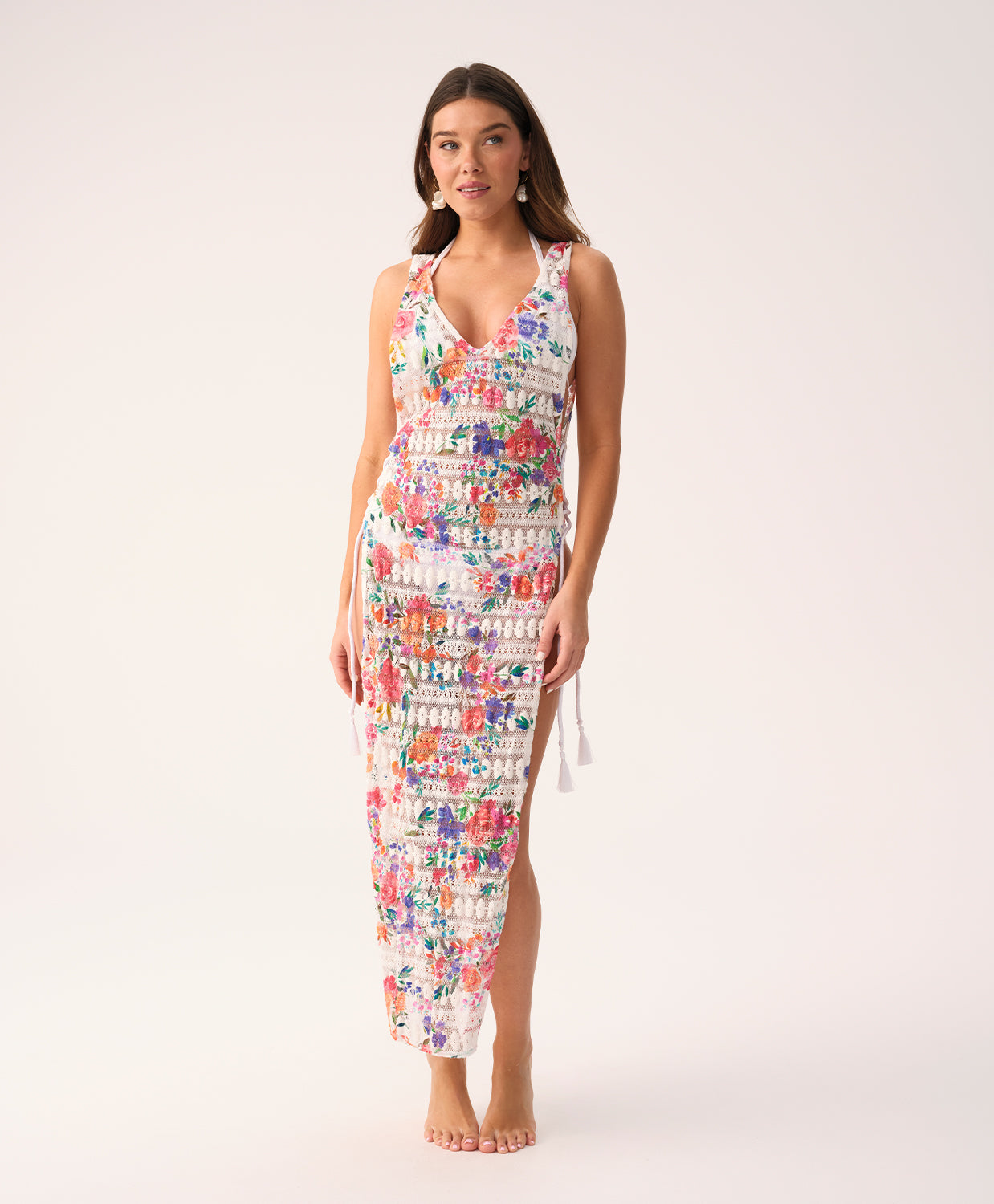 Florencia Joy Lace Cover-Up in white with vibrant, colorful floral patterns