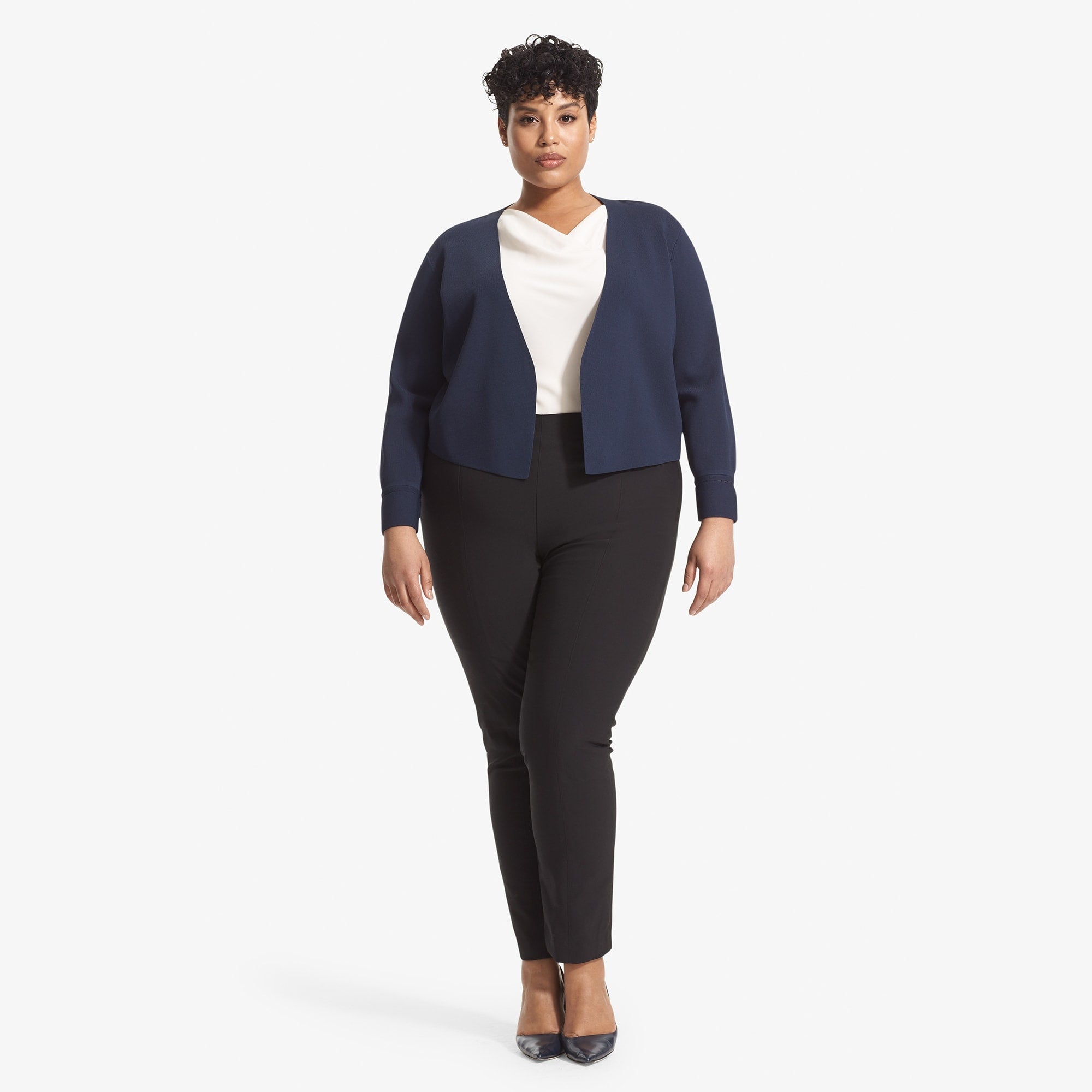front image of a woman wearing the sant ambroeus jardigan in navy | Exclude