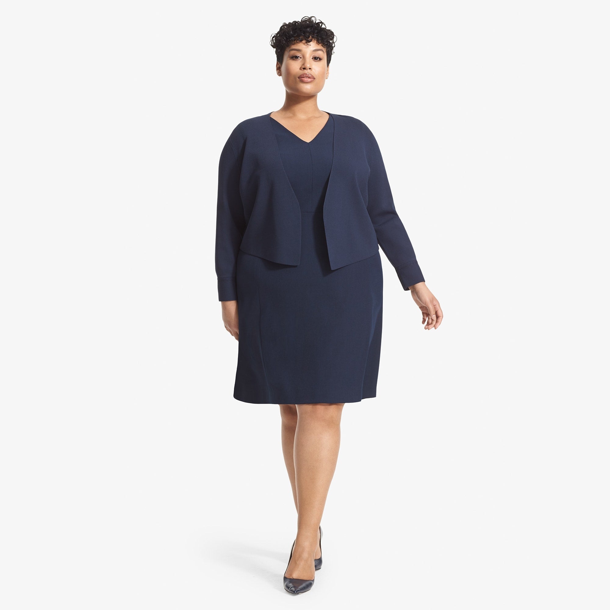 front image of a woman wearing the sant ambroeus jardigan in navy | Exclude