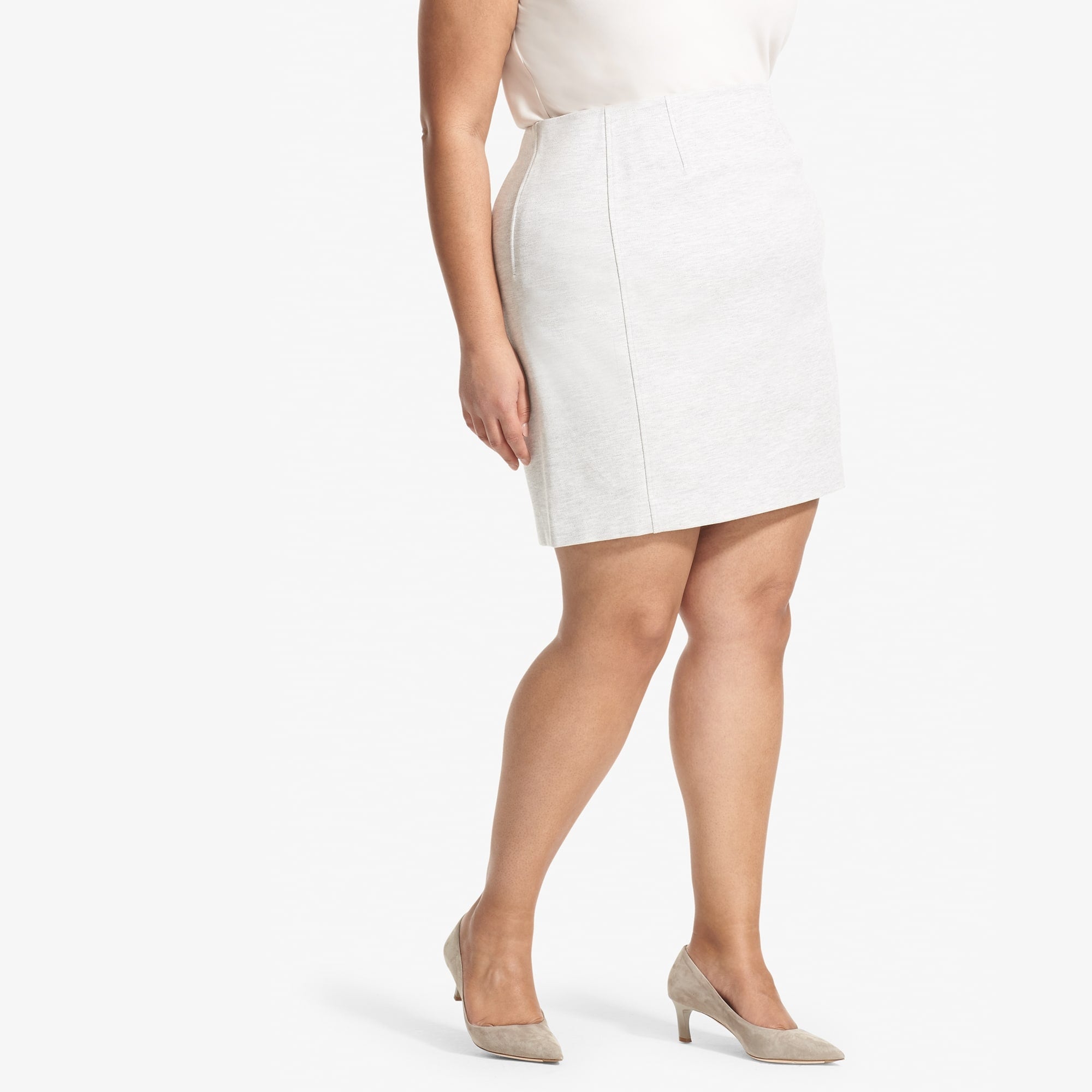Side image of a woman standing wearing the Crosby Twill Ponte in Light Heather Grey
