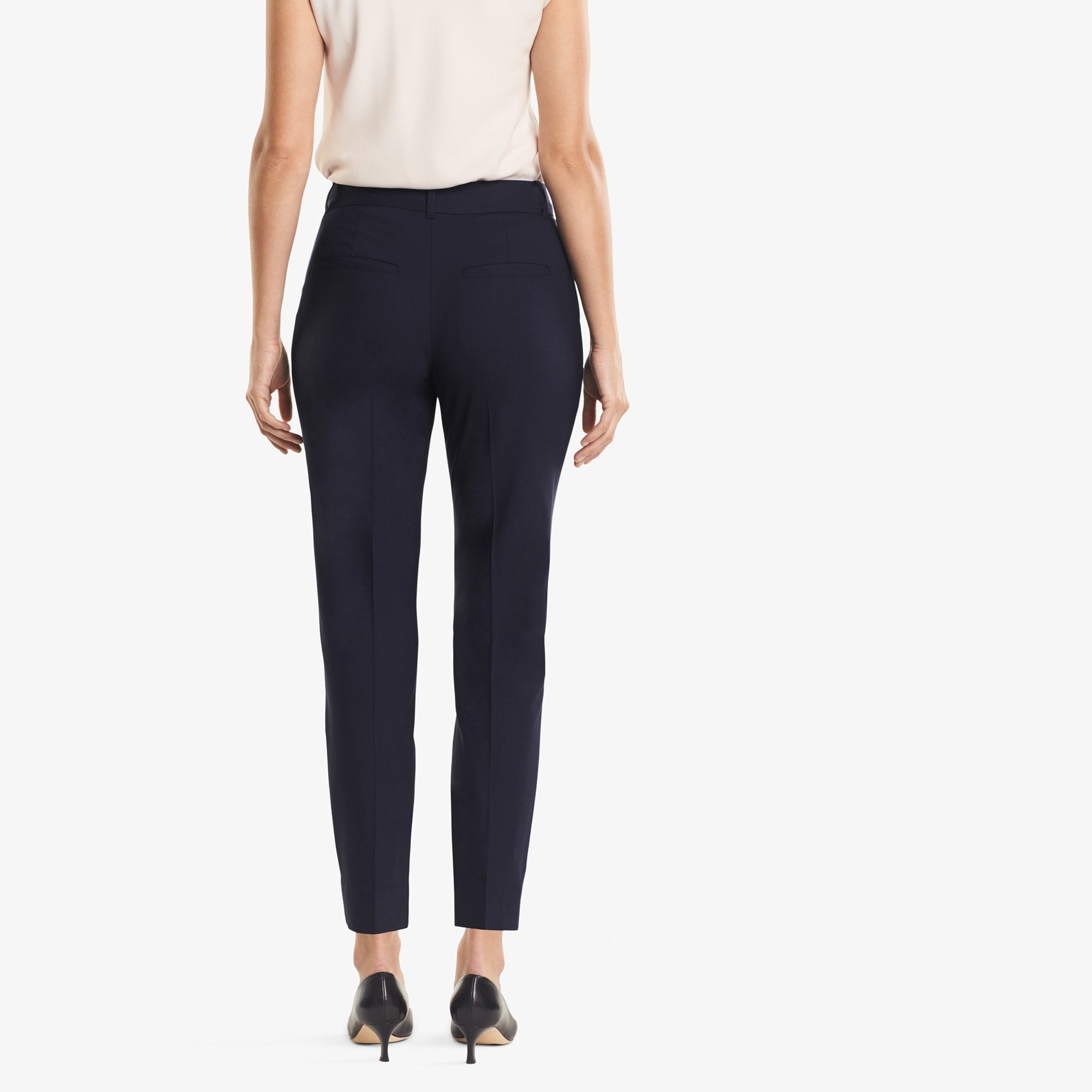 Back image of a woman standing wearing the Mejia pant in Galaxy Blue | Exclude