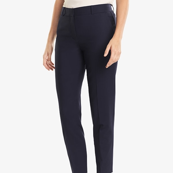 Front image of a woman standing wearing the Mejia pant in Galaxy Blue | Exclude