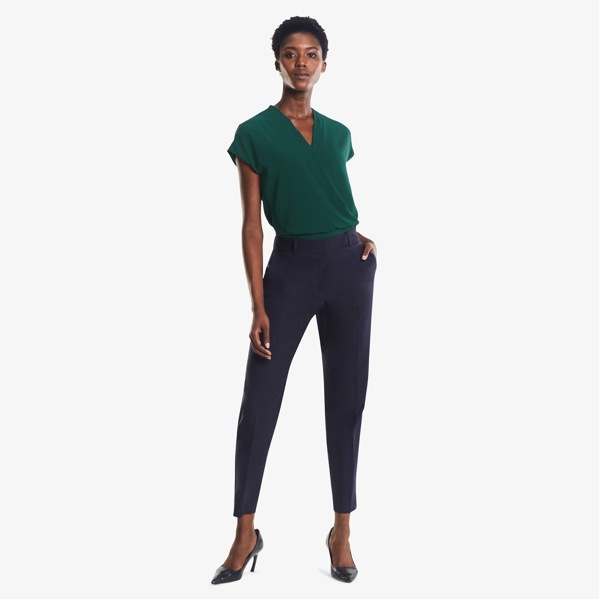 Front image of a woman standing wearing the Mejia pant in Galaxy Blue | Exclude