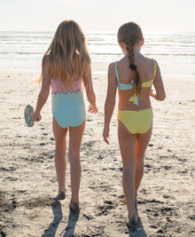 Kids Jellybean Cammy Loop One Piece in purple and blue with braided loop detail.