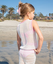 Kids White Chloe Set — a playful white crochet outfit with pink accents and a drawstring waist, perfect for sunny adventures.