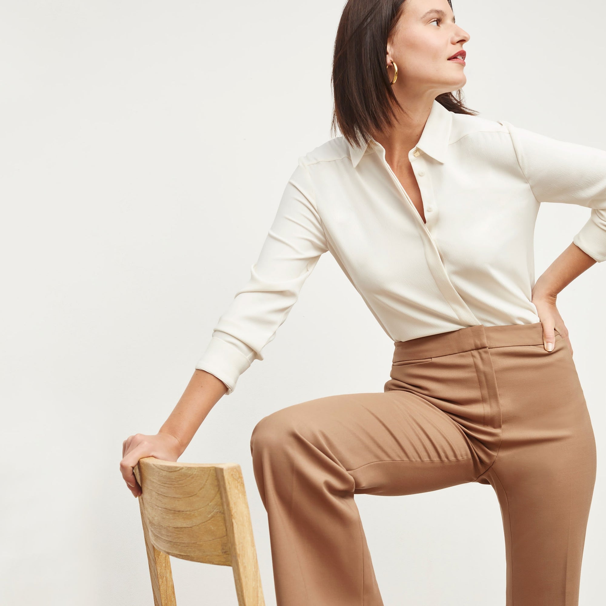 Front image of a woman standing wearing the Lagarde Shirt—Soft Wave in Alabaster | Exclude