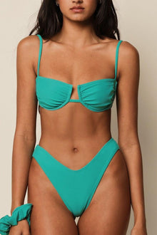 Teal bikini bottom with zig-zag stitching detail and high-cut leg openings.
