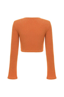 Orange sparkle knit crop top with long flared sleeves and crew neckline.