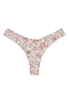 Cream bikini bottom with pink and tan floral print and zig-zag stitching on edges.