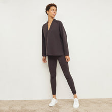 Front image of a woman standing wearing the Harrington Legging—Light Scuba in Haze