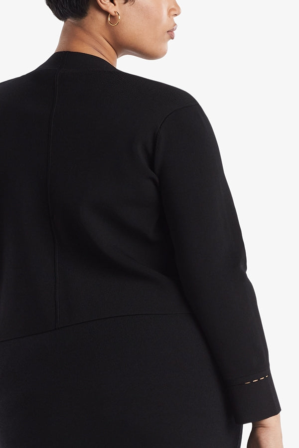 Back image of a woman standing wearing the Sant Ambroeus jardigan in black | Plus Hover | Exclude