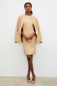 Front image of a woman wearing the Constance Dress - Everyday Twill in Butter | Grid Hover | Exclude