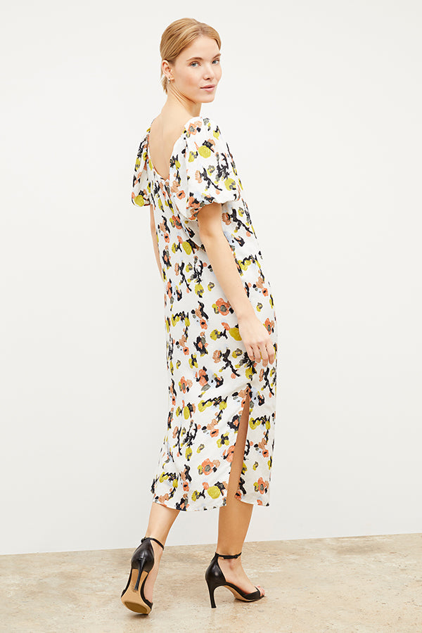 Front image of a woman wearing the Gali dress in meadow print linen | Grid | Exclude