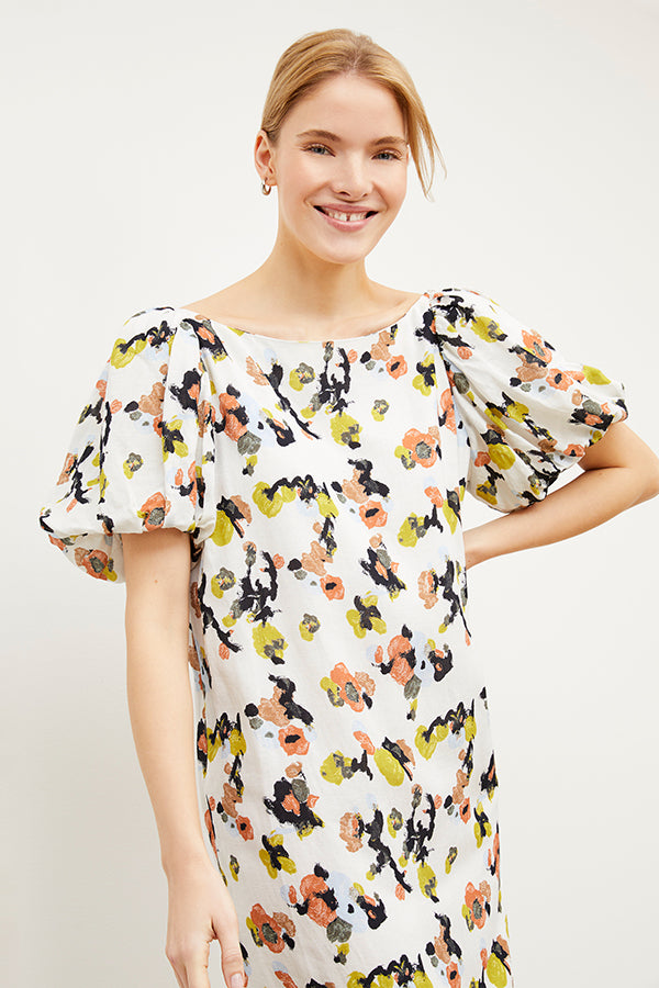Front image of a woman wearing the Gali dress in meadow print linen | Exclude | Grid Hover