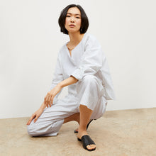 Image of a woman wearing the Chiara Top in Blue / Ivory