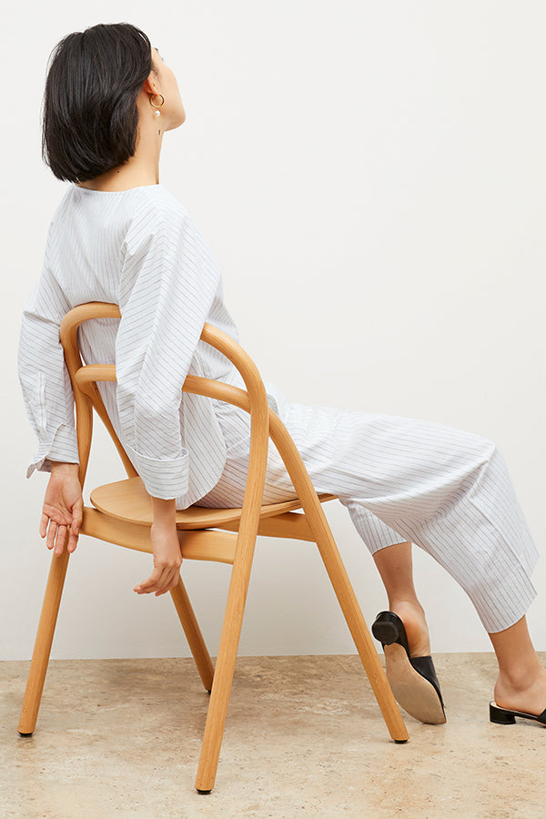 Image of a woman wearing the Chiara Top in Blue / Ivory | Exclude