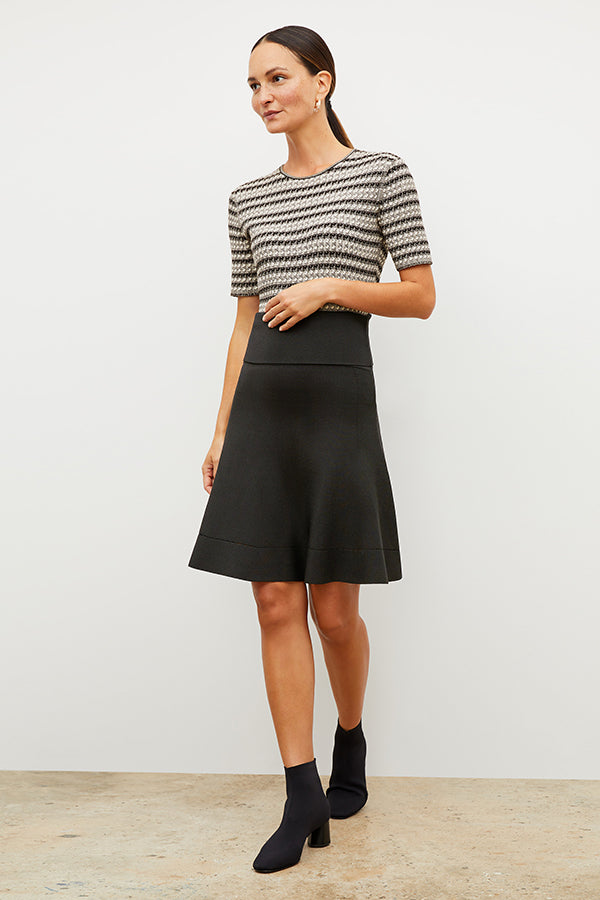 Front image of a woman wearing the luca skirt in black | Exclude | Grid