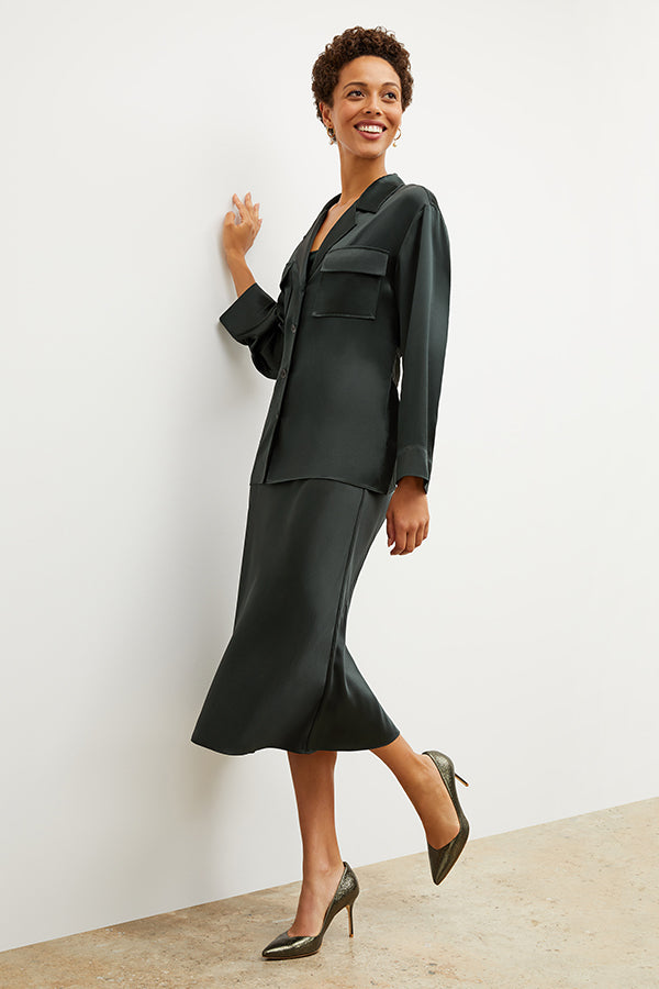 Image of a woman wearing the Alyssa Jacket in Hunter | Exclude