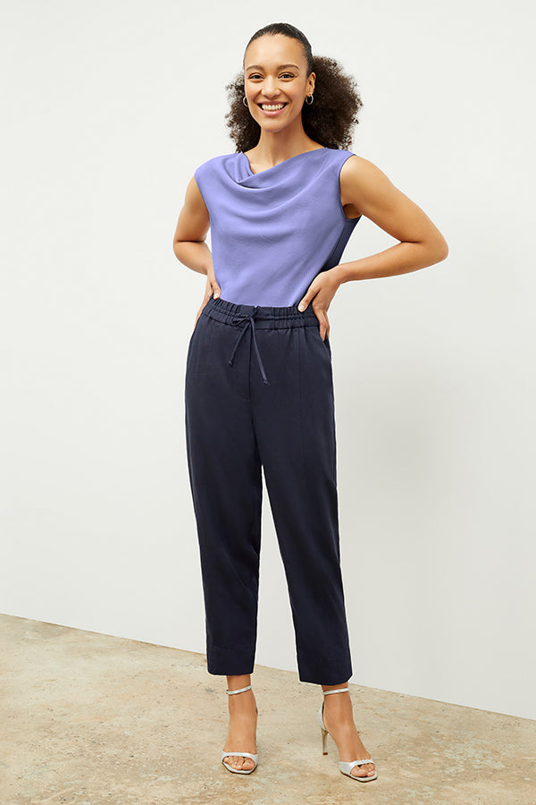 Front image of a woman wearing the Shane Pant - Everyday Twill in Night | Exclude | Grid
